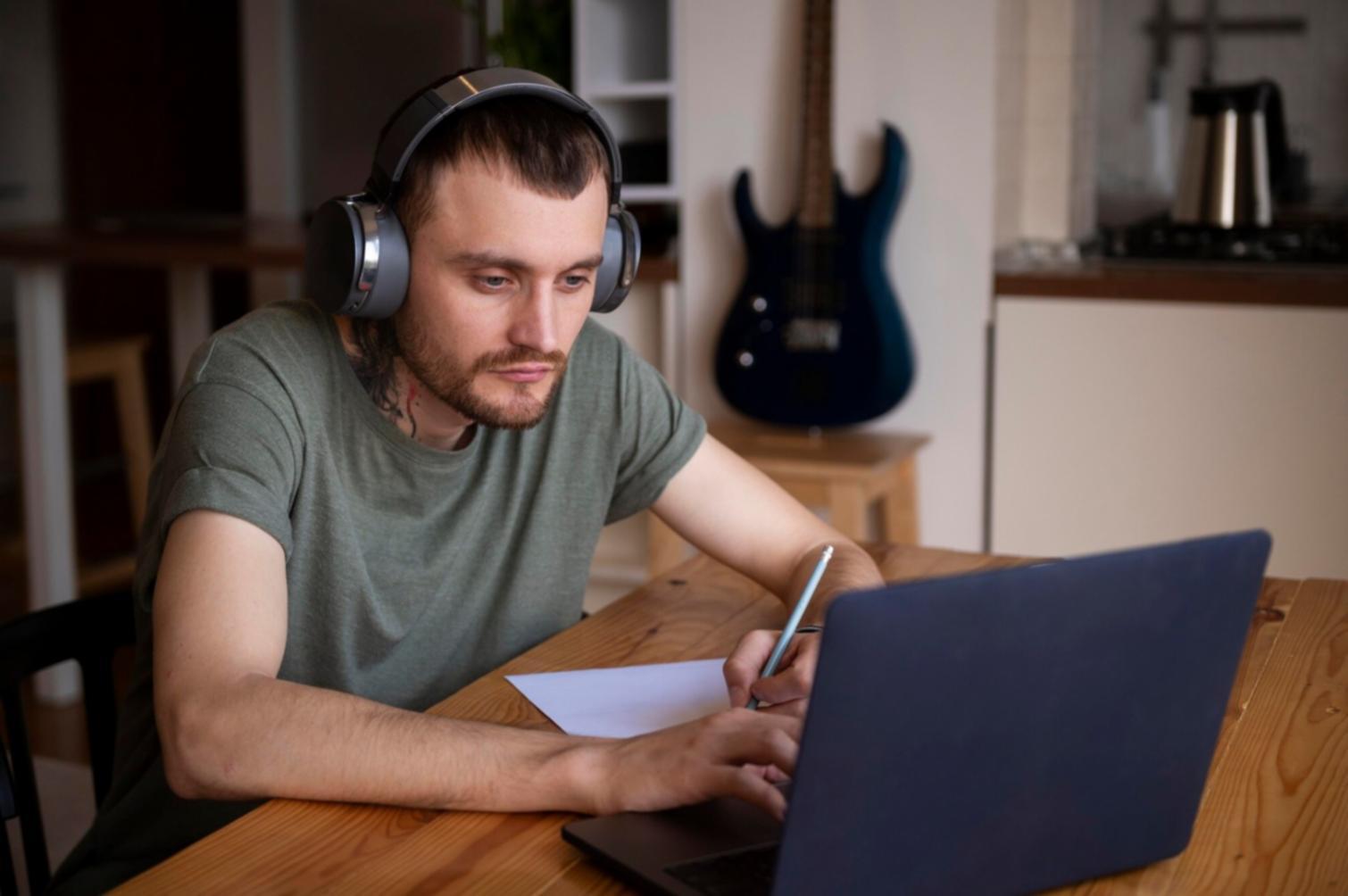Students engaged in financial planning workshop with calculators and charts